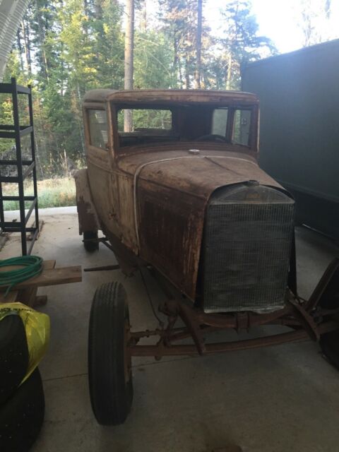 1931 rusty Ford Model A Victoria