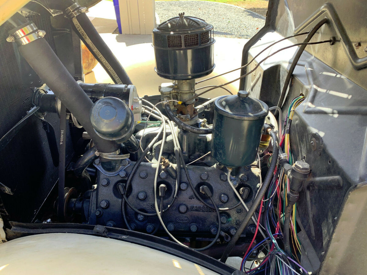 1936 yellow Ford Model 50 Flatbed dually