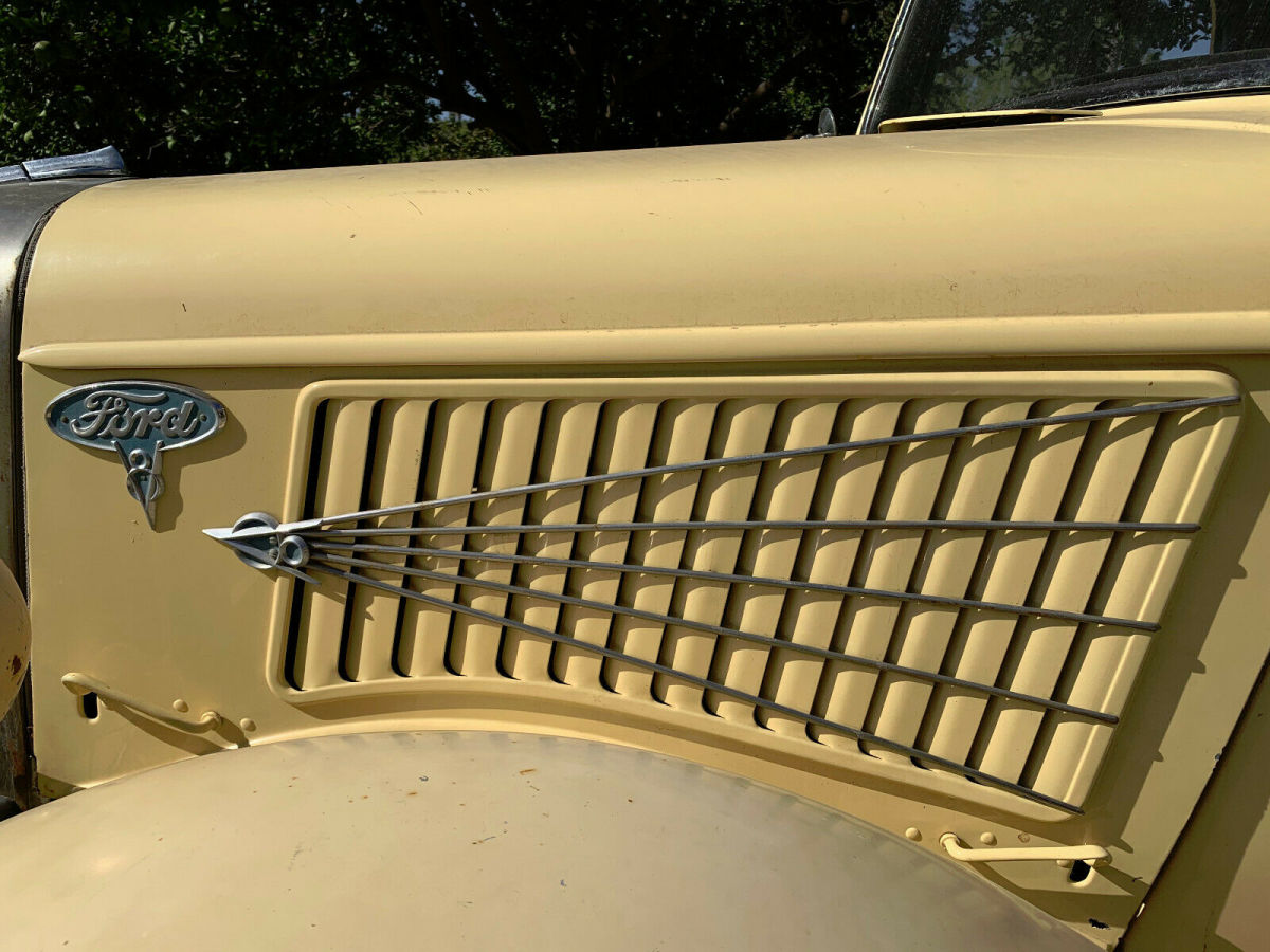 1936 yellow Ford Model 50 Flatbed dually