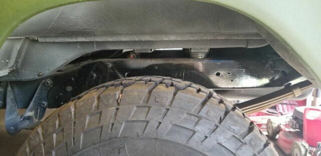 1978 Army green Ford Bronco SUV