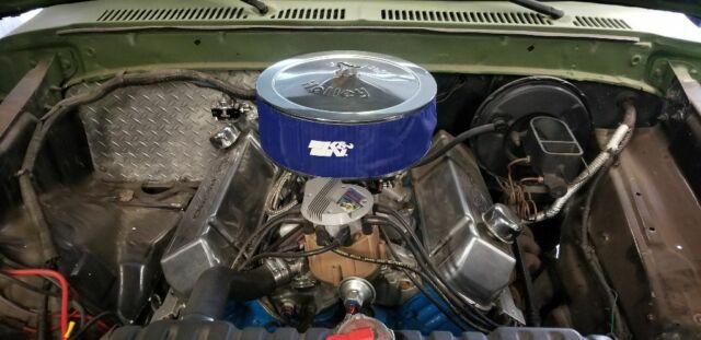 1978 Army green Ford Bronco SUV