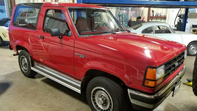 1989 Red Ford Bronco II 2d