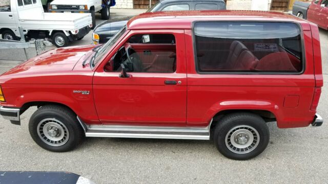 1989 Red Ford Bronco II 2d