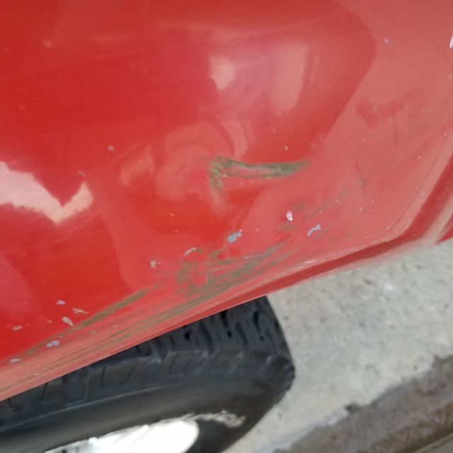 1986 Silver and Canyon Red Ford Bronco II SUV