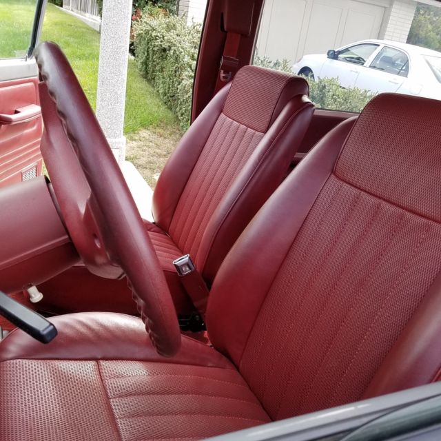 1986 Silver and Canyon Red Ford Bronco II SUV