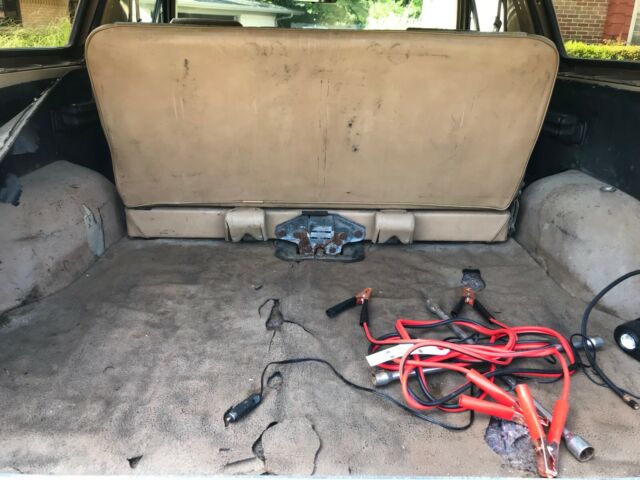 1990 pale brown (nude pantyhose) Ford Bronco Convertible