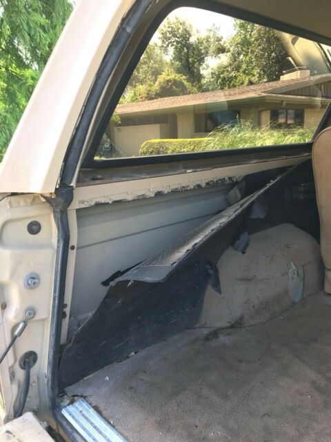 1990 pale brown (nude pantyhose) Ford Bronco Convertible