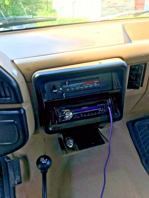 1990 pale brown (nude pantyhose) Ford Bronco Convertible