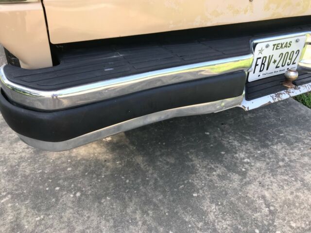 1990 pale brown (nude pantyhose) Ford Bronco Convertible