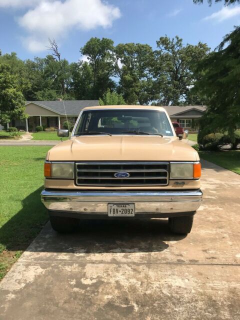 1990 pale brown (nude pantyhose) Ford Bronco Convertible