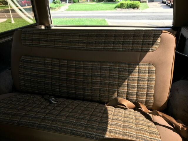 1990 pale brown (nude pantyhose) Ford Bronco Convertible