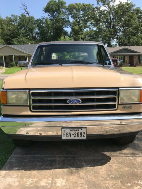 1990 pale brown (nude pantyhose) Ford Bronco Convertible