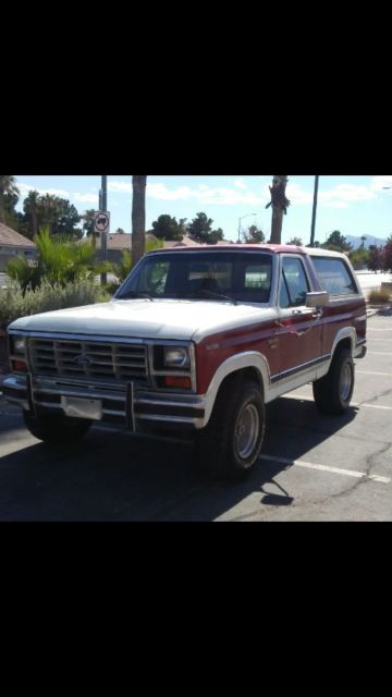 1989 Burgundy Ford Bronco SUV