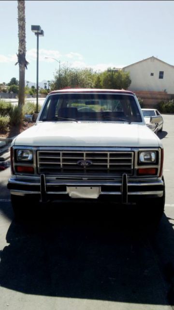 1989 Burgundy Ford Bronco SUV