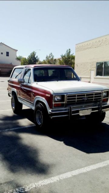1989 Burgundy Ford Bronco SUV