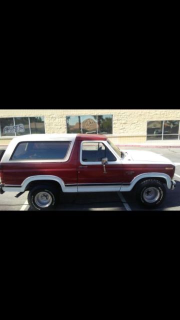 1989 Burgundy Ford Bronco SUV