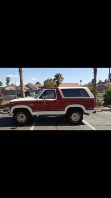 1989 Burgundy Ford Bronco SUV