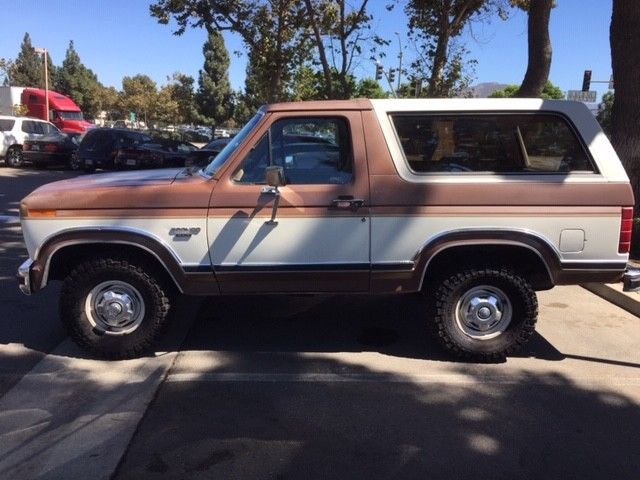1986 Tan Ford Bronco SUV