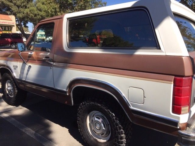 1986 Tan Ford Bronco SUV