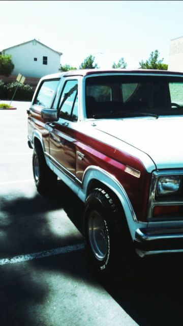 1989 Burgundy Ford Bronco SUV