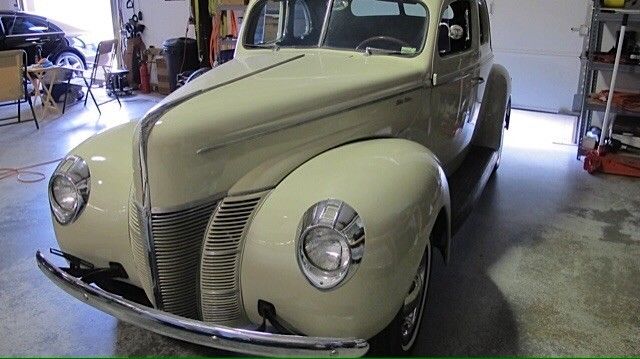 1940 Cream Ford Deluxe Coupe