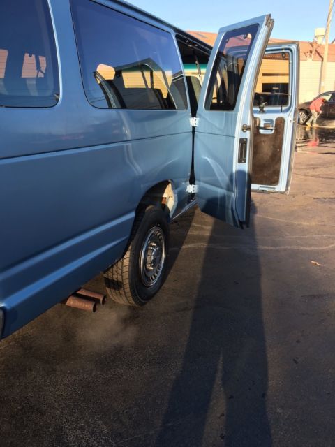 1994 Blue Ford E-Series Van