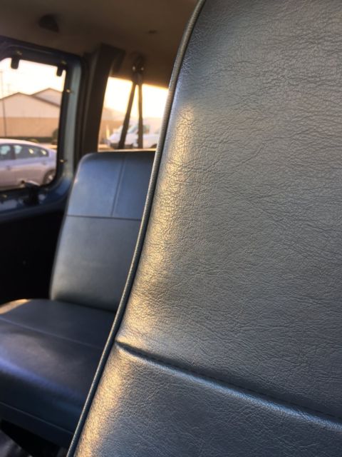 1994 Blue Ford E-Series Van