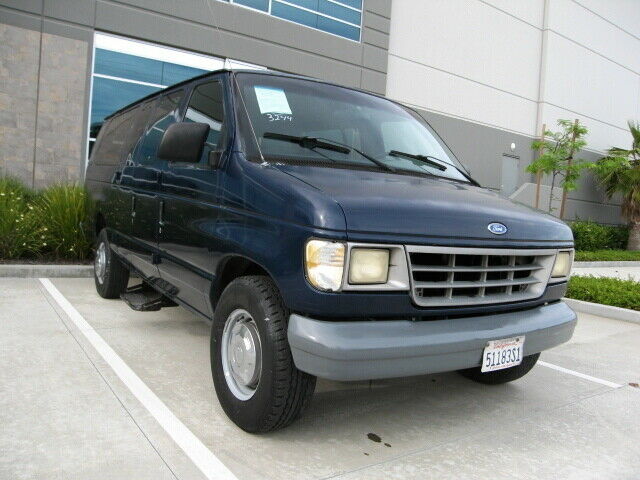 1992 Blue Ford E-Series Van
