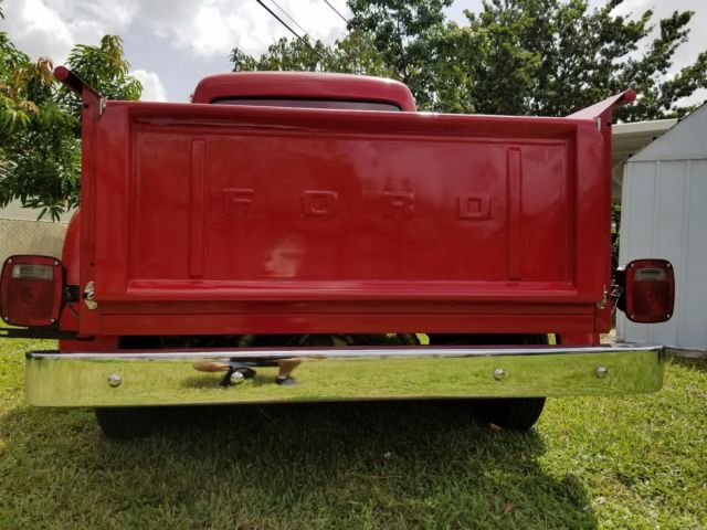 1955 Red Ford F-100 Crew Cab Pickup