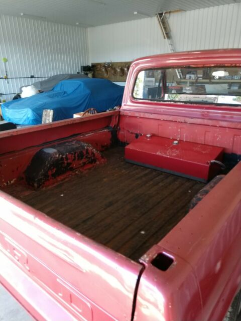 1967 Red Ford F-100 Standard Cab Pickup