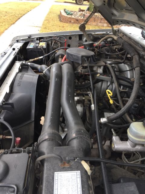 1987 Metalic Silver Ford F-100 Standard Cab Pickup