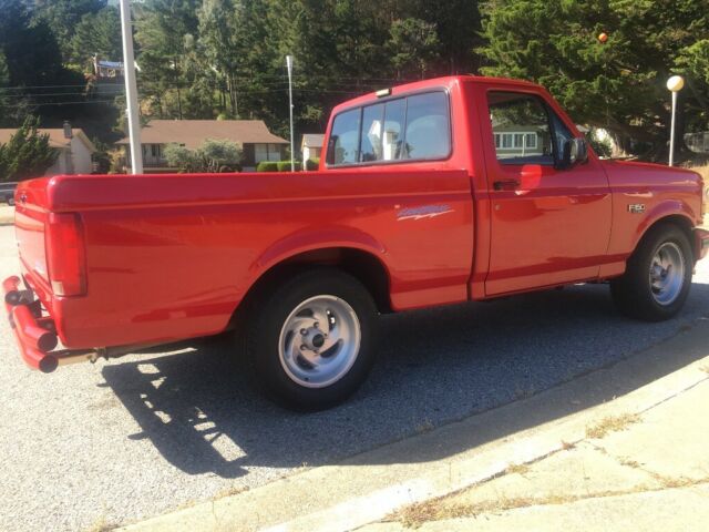 1993 Red Ford F-150 Standard Cab Pickup