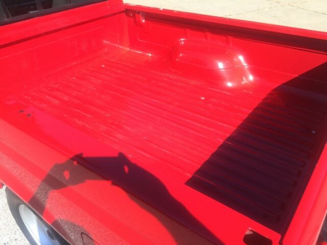 1993 Red Ford F-150 Standard Cab Pickup