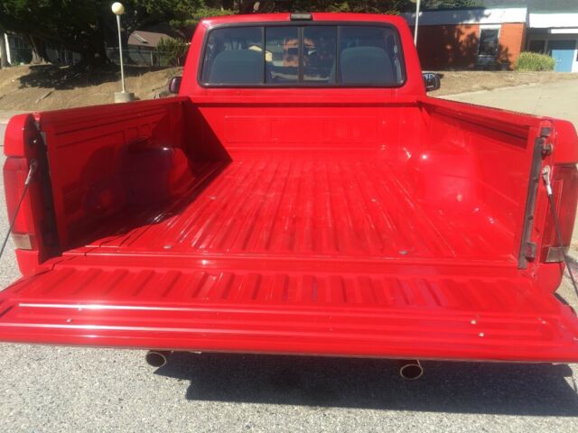 1993 Red Ford F-150 Standard Cab Pickup