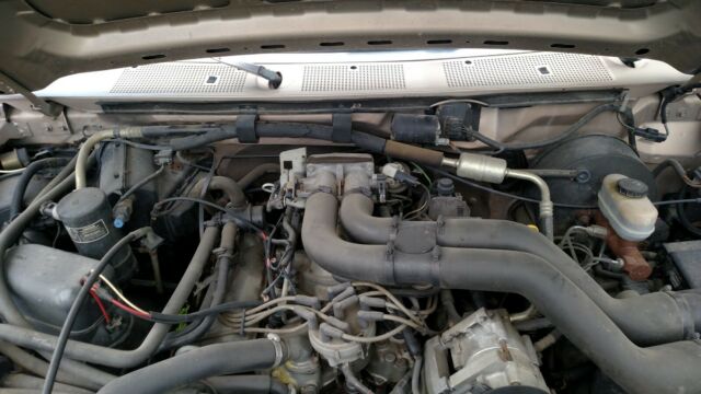 1993 Tan Ford F-250 Extended Cab Pickup