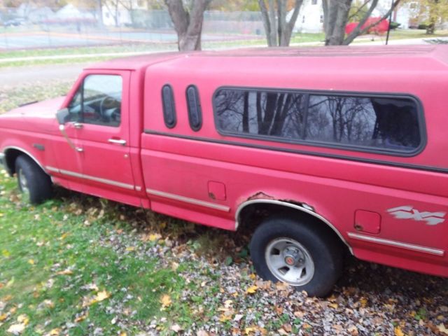 1993 Red Ford F-150 Standard Cab Pickup