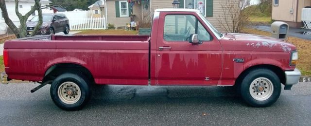 1993 Red Ford F-150 Standard Cab Pickup