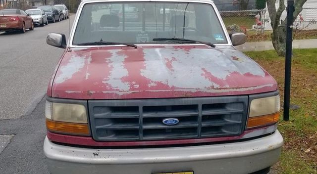1993 Red Ford F-150 Standard Cab Pickup