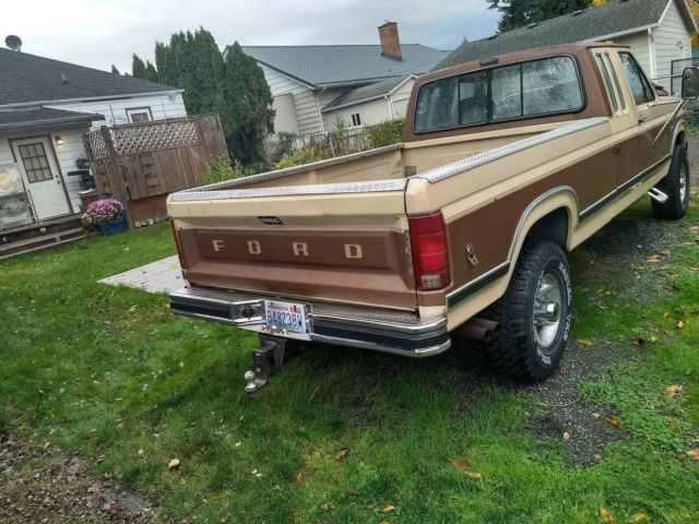 1986 two tone light and dark brown Ford F-250 Extended Cab Pickup