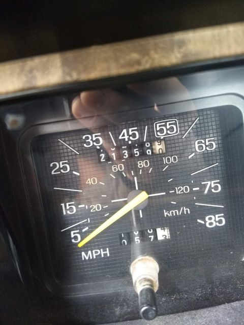 1986 two tone light and dark brown Ford F-250 Extended Cab Pickup