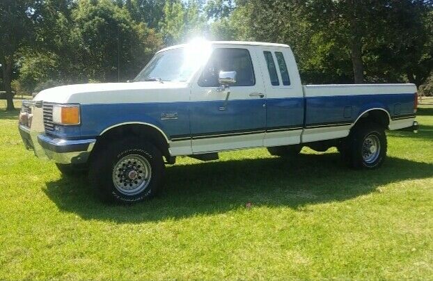 1989 White with Blue stripe - two tone Ford F-250 Extended Cab Pickup