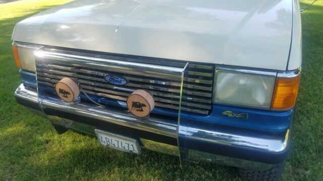 1989 White with Blue stripe - two tone Ford F-250 Extended Cab Pickup