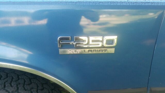 1989 White with Blue stripe - two tone Ford F-250 Extended Cab Pickup