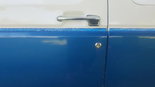 1989 White with Blue stripe - two tone Ford F-250 Extended Cab Pickup