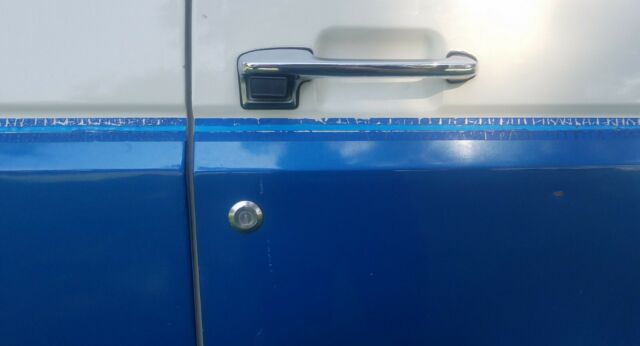 1989 White with Blue stripe - two tone Ford F-250 Extended Cab Pickup