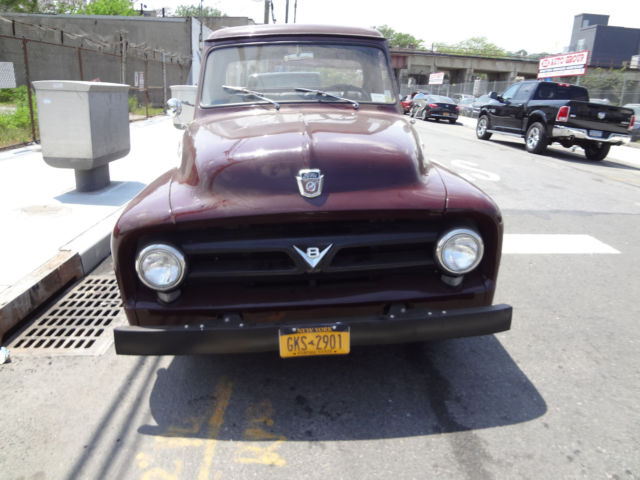 1951 Burgundy Ford F-250 pickup