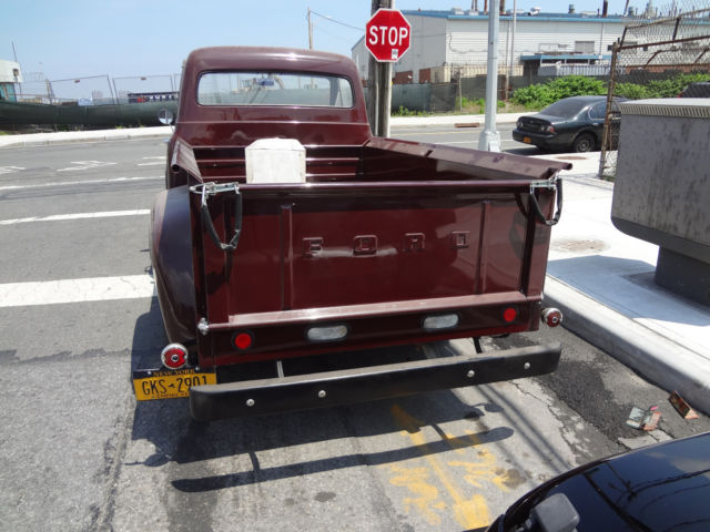 1951 Burgundy Ford F-250 pickup