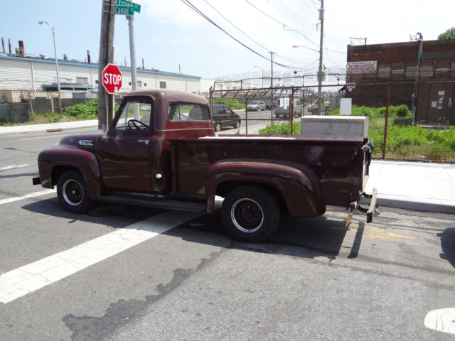 1951 Burgundy Ford F-250 pickup