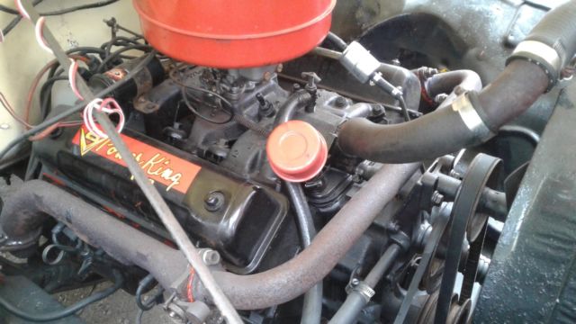 1954 cream Ford F-250 stake bed