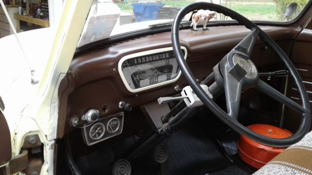 1954 cream Ford F-250 stake bed